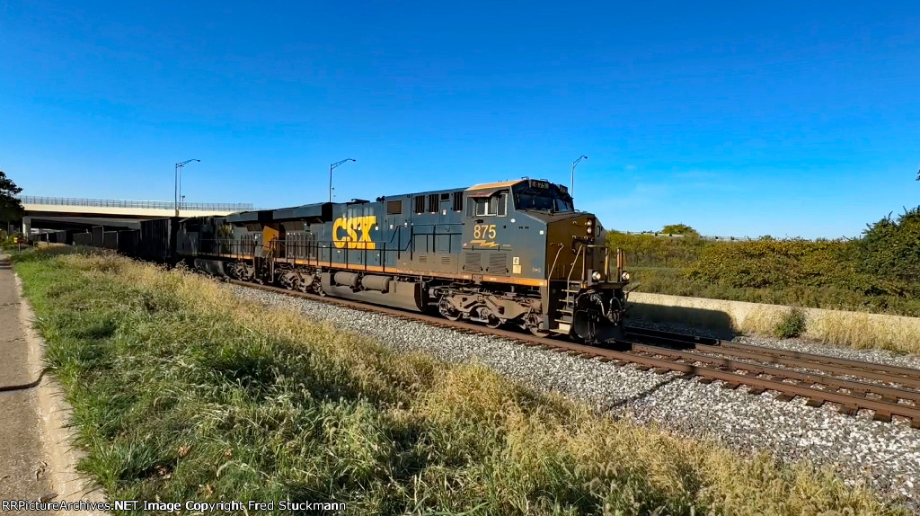 CSX 875 leads B158, the empties.